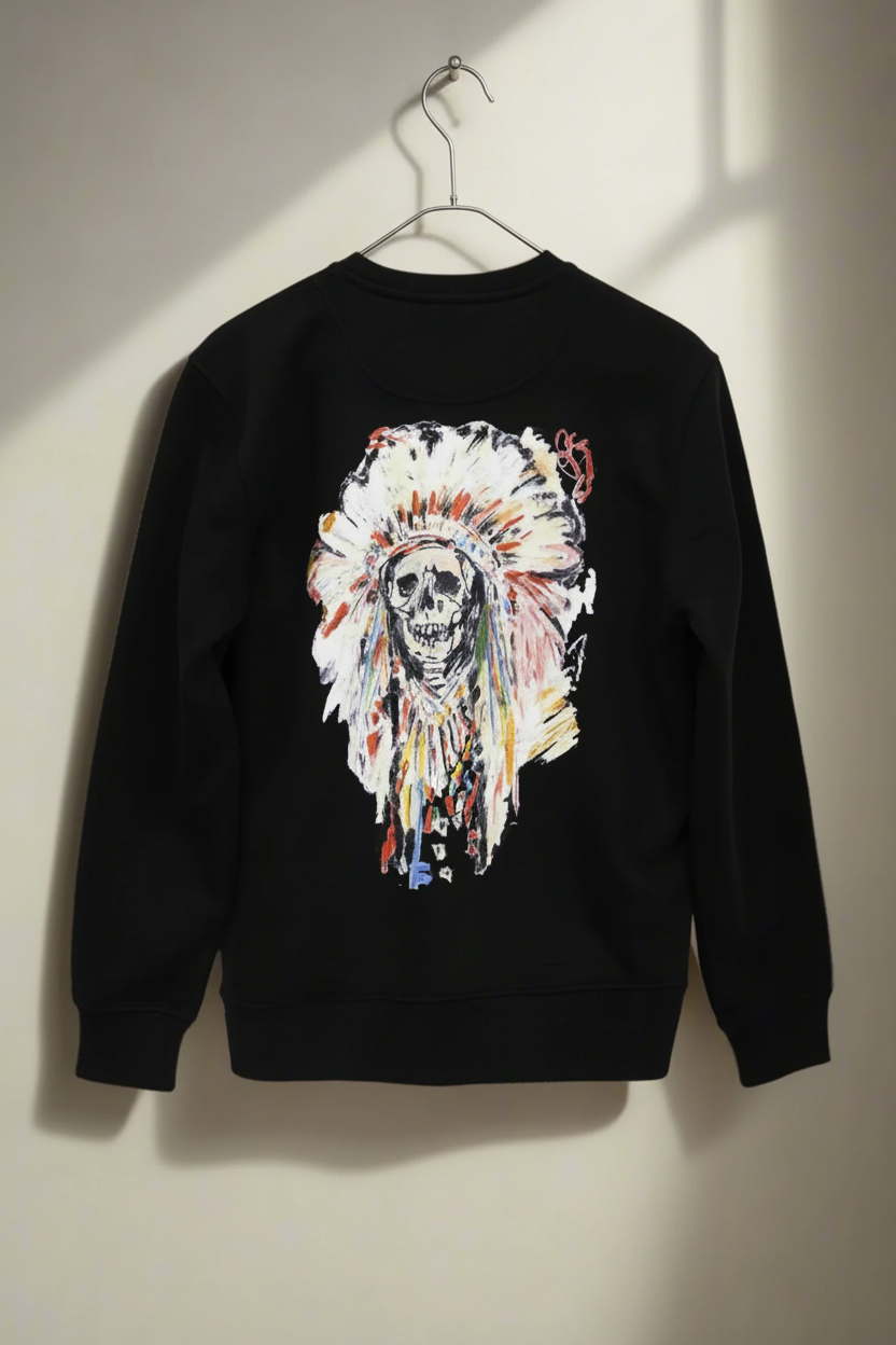 Black sweatshirt back hanging on grey wall